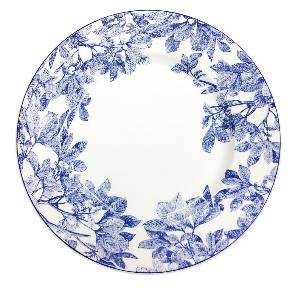 Top view of Blue Arbor charger plate showcasing blue leafy branch pattern on white porcelain with thin blue rim