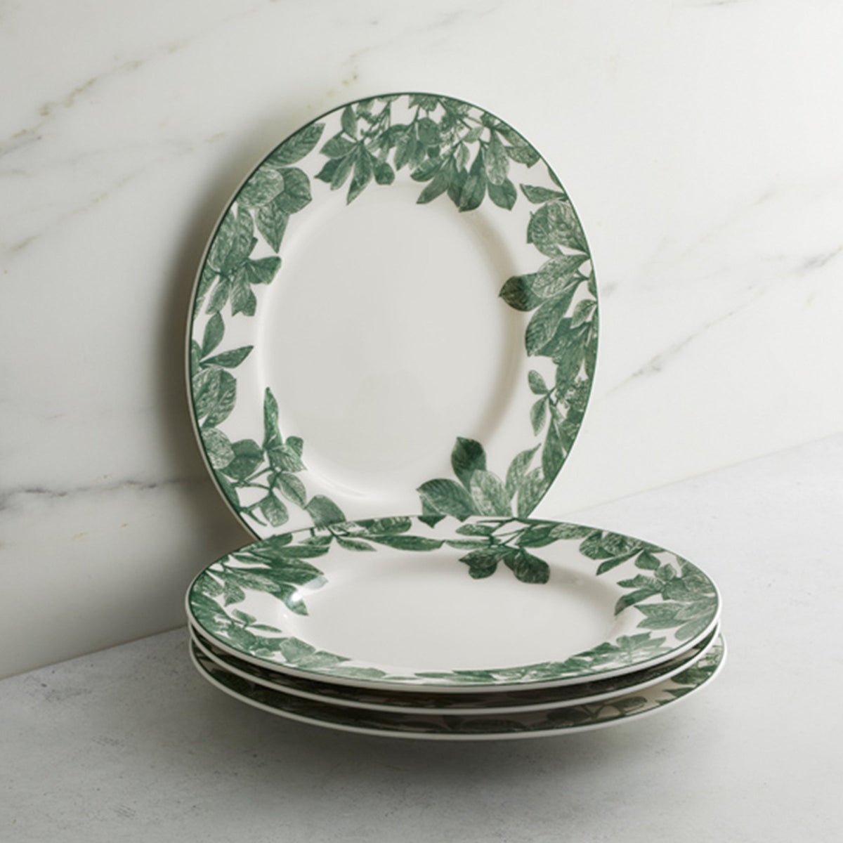 A set of Arbor Green Salad Plates from the Caskata brand collection.