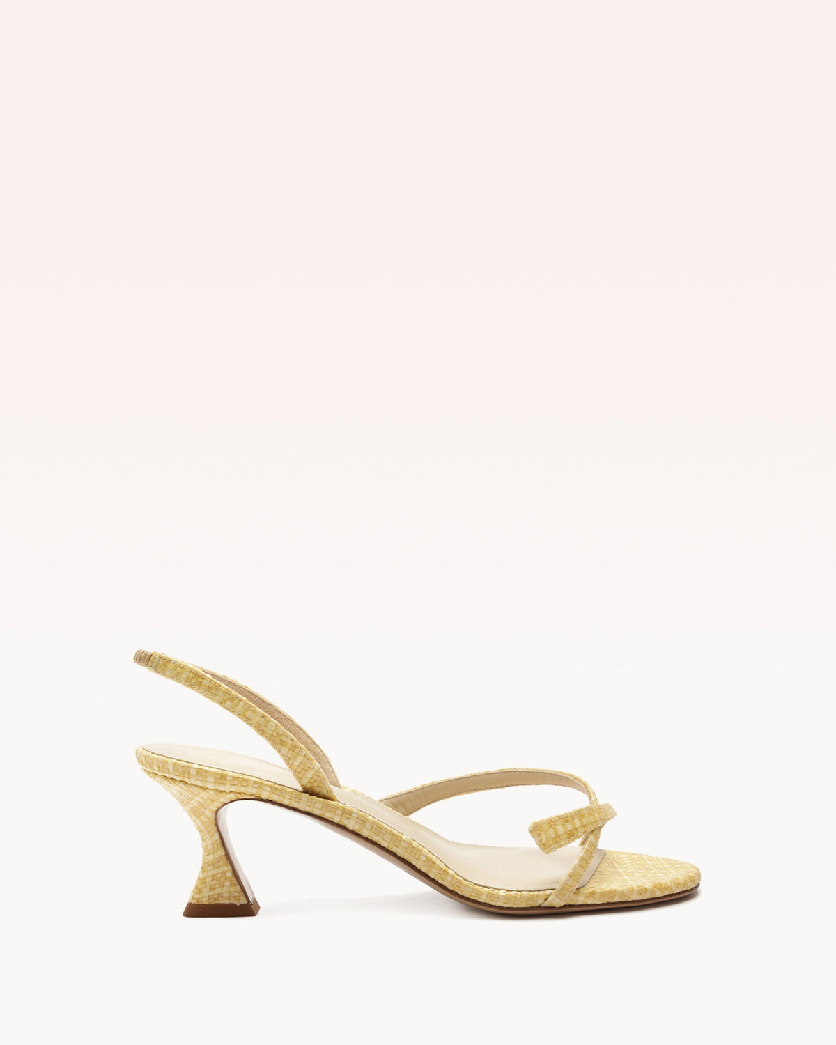 Side view of the Tita Bell 60 in Natural Naja showcasing its slingback strap and medium stiletto heel on a white background