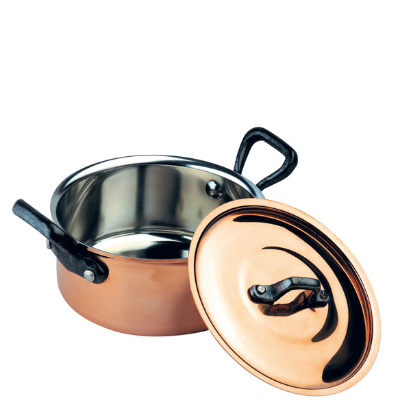 Open view of Baumalu Mini Stew Pot with Lid showcasing copper body, tin-lined interior, and cast-iron handles on white background