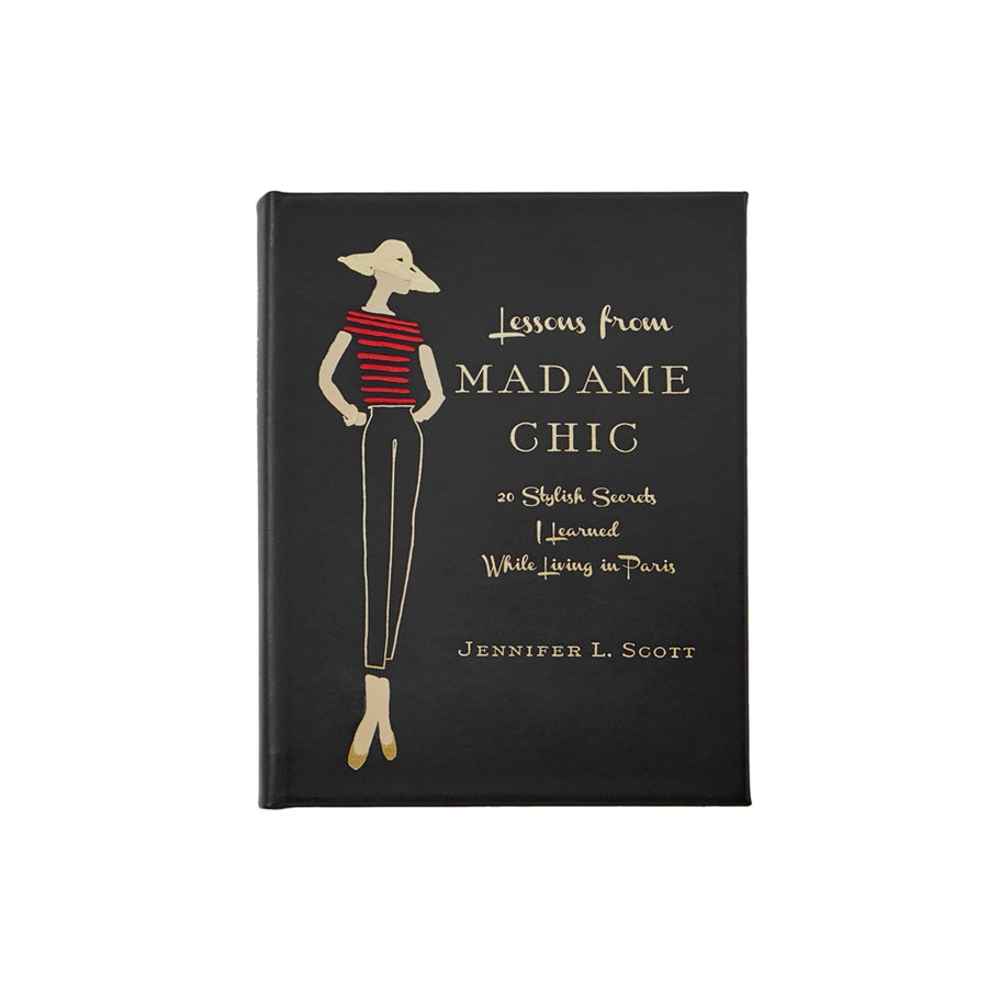 Front view of Lessons from Madame Chic in bonded leather with gold Parisian illustration and lettering on a white background