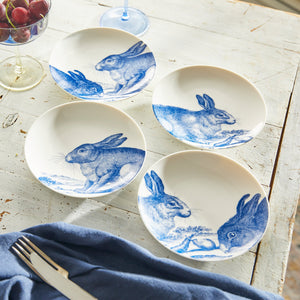 Four Bunnies Blue Canapé Plates from Caskata Artisanal Home, perfect for serving canapés.