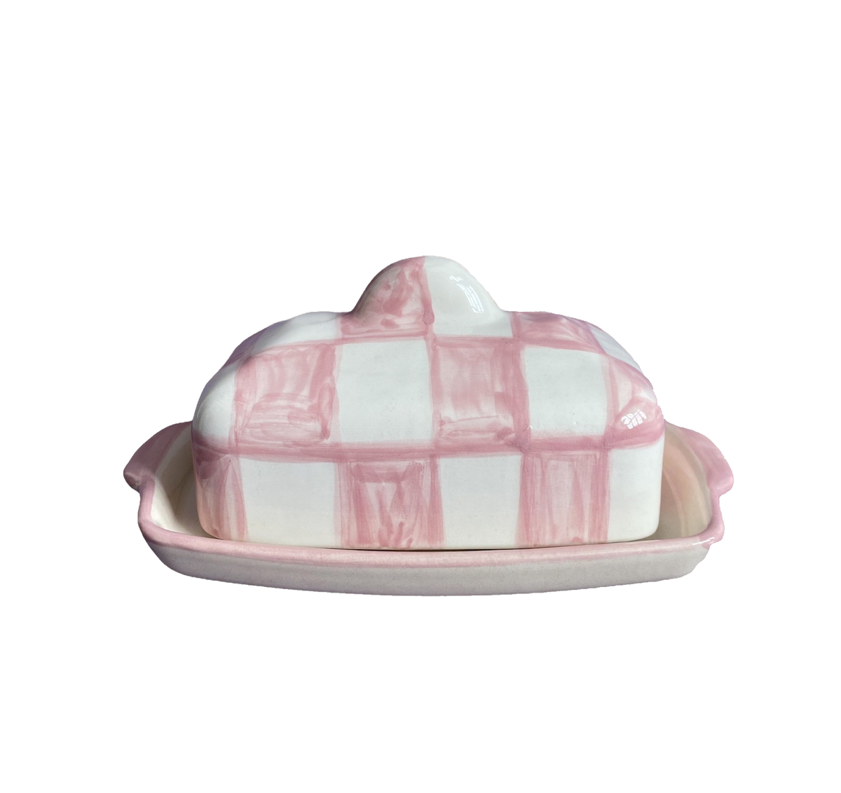 Front view of Buttercup butterdish showcasing white and pink checkerboard pattern with white background