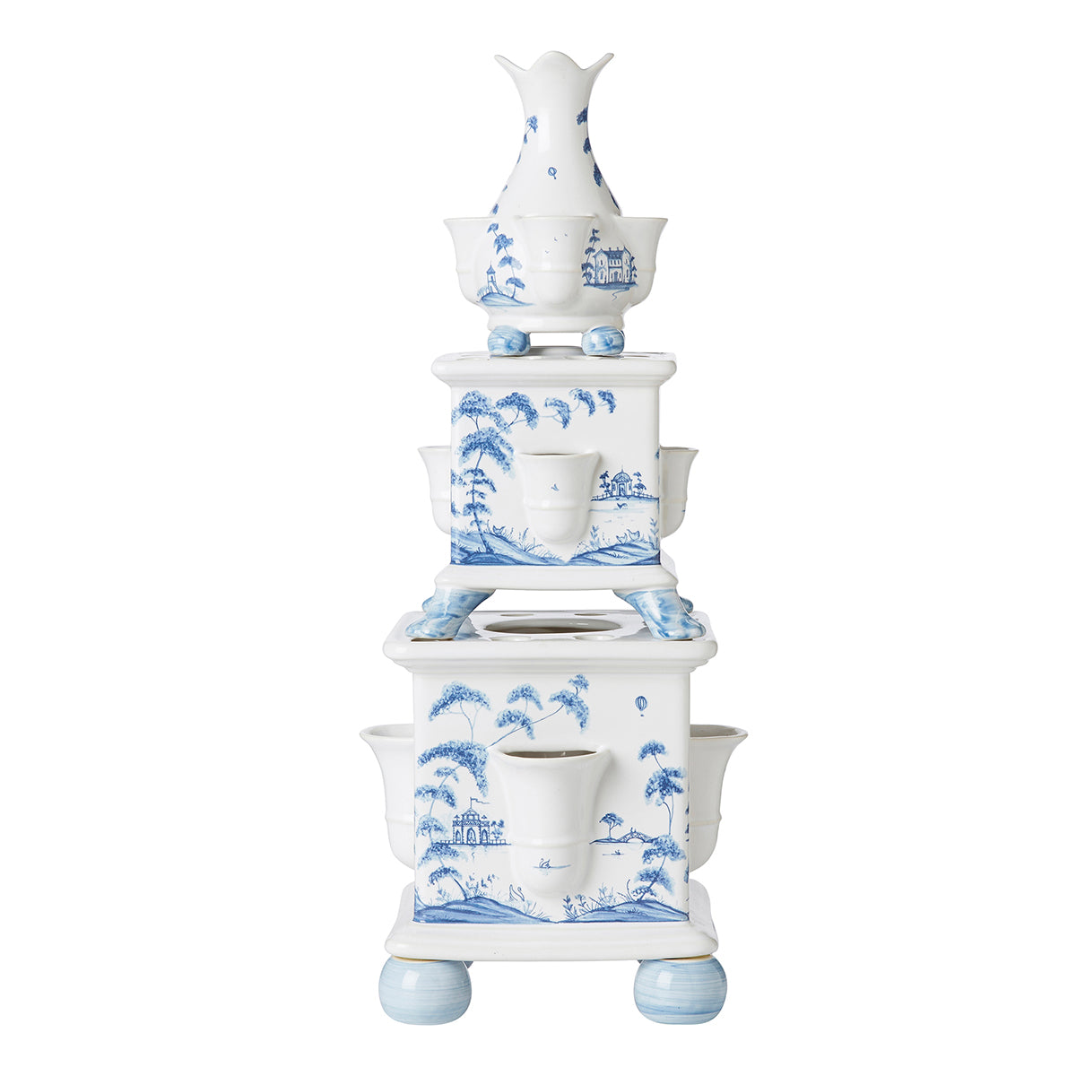 Front view of Country Estate Delft Blue tulipiere tower, three-tier ceramic set of 3 with blue Delft scenic pattern on white