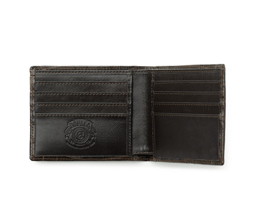 Open view of Classic Wallet No 101 in walnut crocodile leather showing eight card slots, leather-lined currency divider, and embossed Ghurka logo on white background