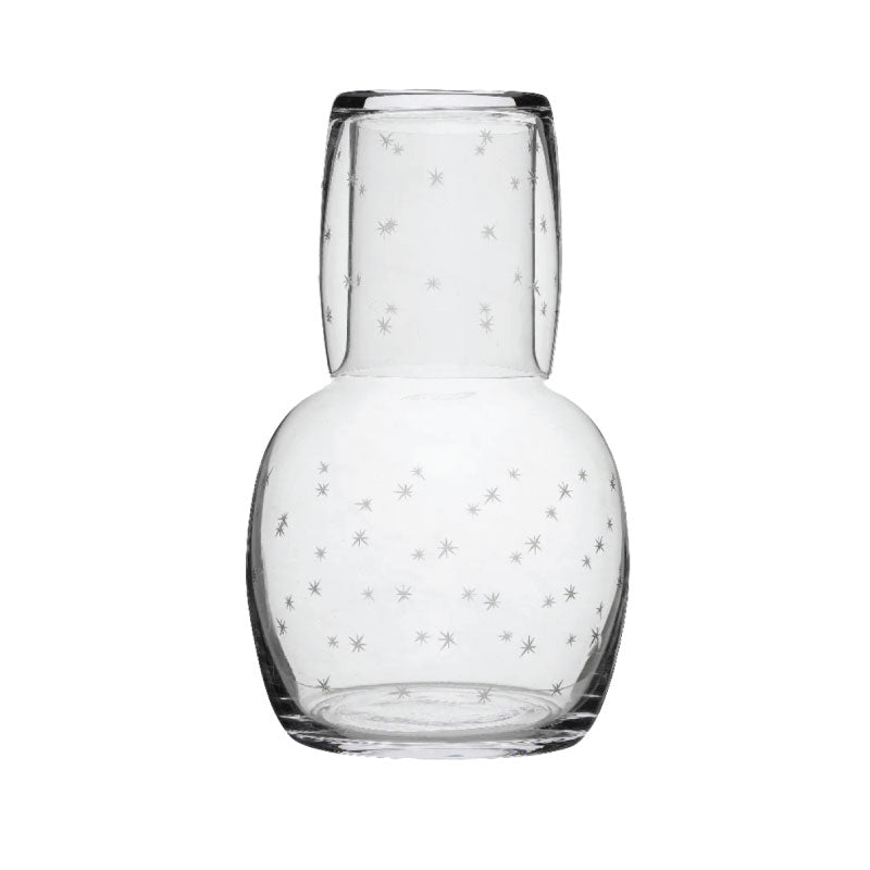 Front view of crystal carafe from the Crystal Carafe Set showcasing engraved star pattern on white background