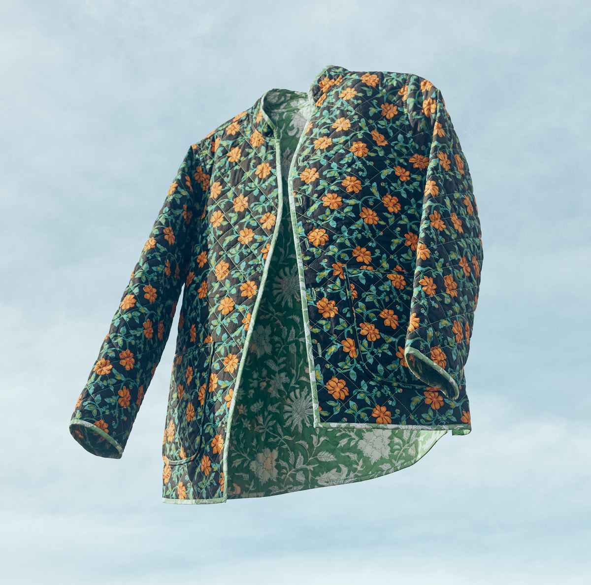 Nancy Reversible Quilted Jacket in Faded Black with Clementine Moss Floral