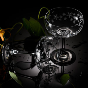 A pair of Chatham Bloom coupe cocktail glasses, etched floral design in lead-free crystal by Caskata.