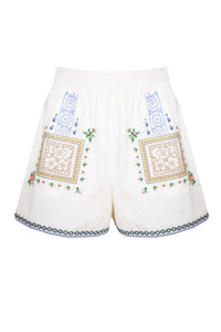 The Amanda shorts have mosaic embroidery, striped piping along the hemline and an elastic waistband.