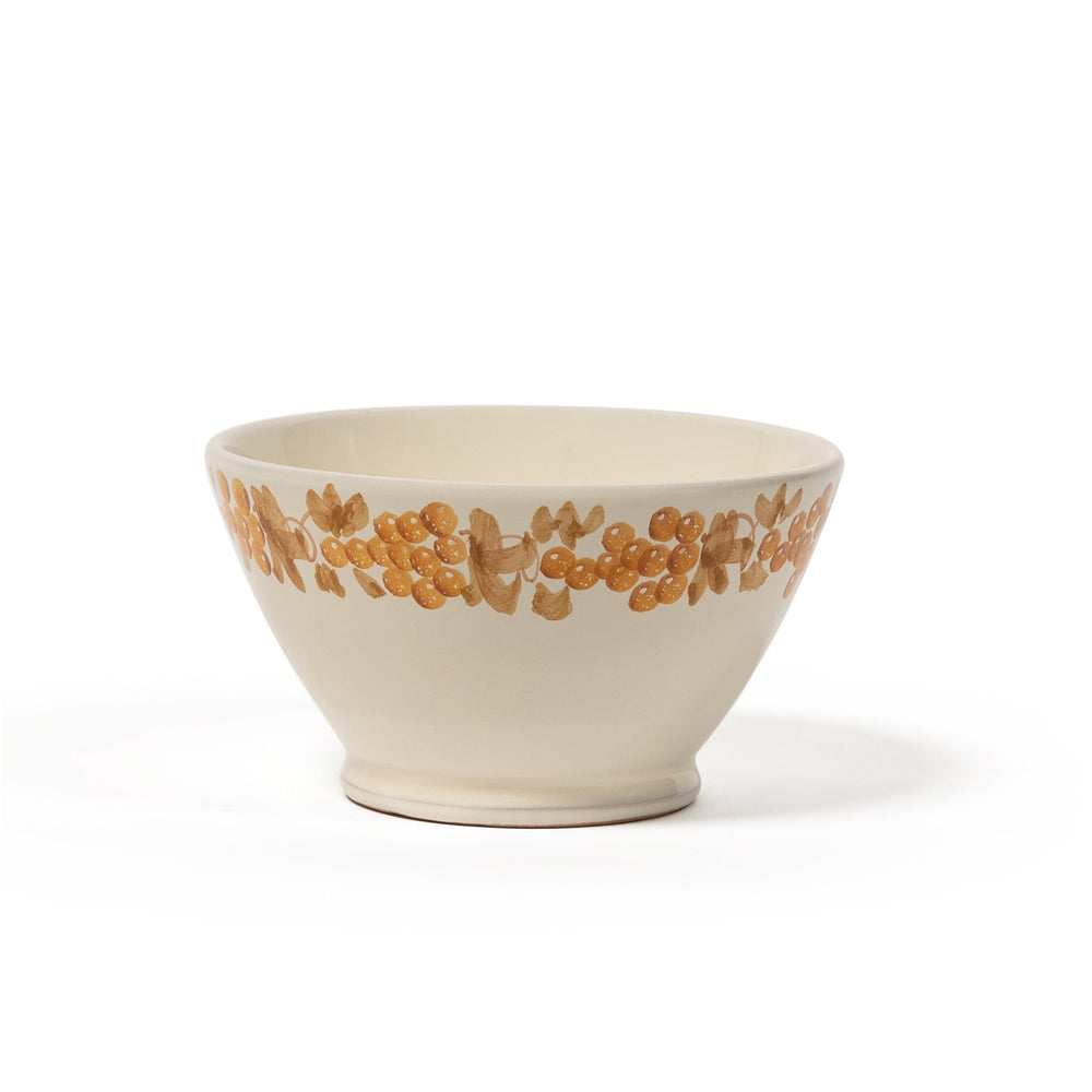 Front view of Vine Bowl, Small showcasing hand-painted mustard yellow vine-and-berry pattern on cream ceramic with white background