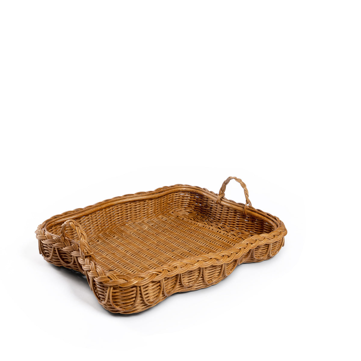 Side Photo of Sharland-England's Hadley tray Hand-crafted from 100% natural rattan, featuring fixed handles and a beautifully braided, scalloped edge