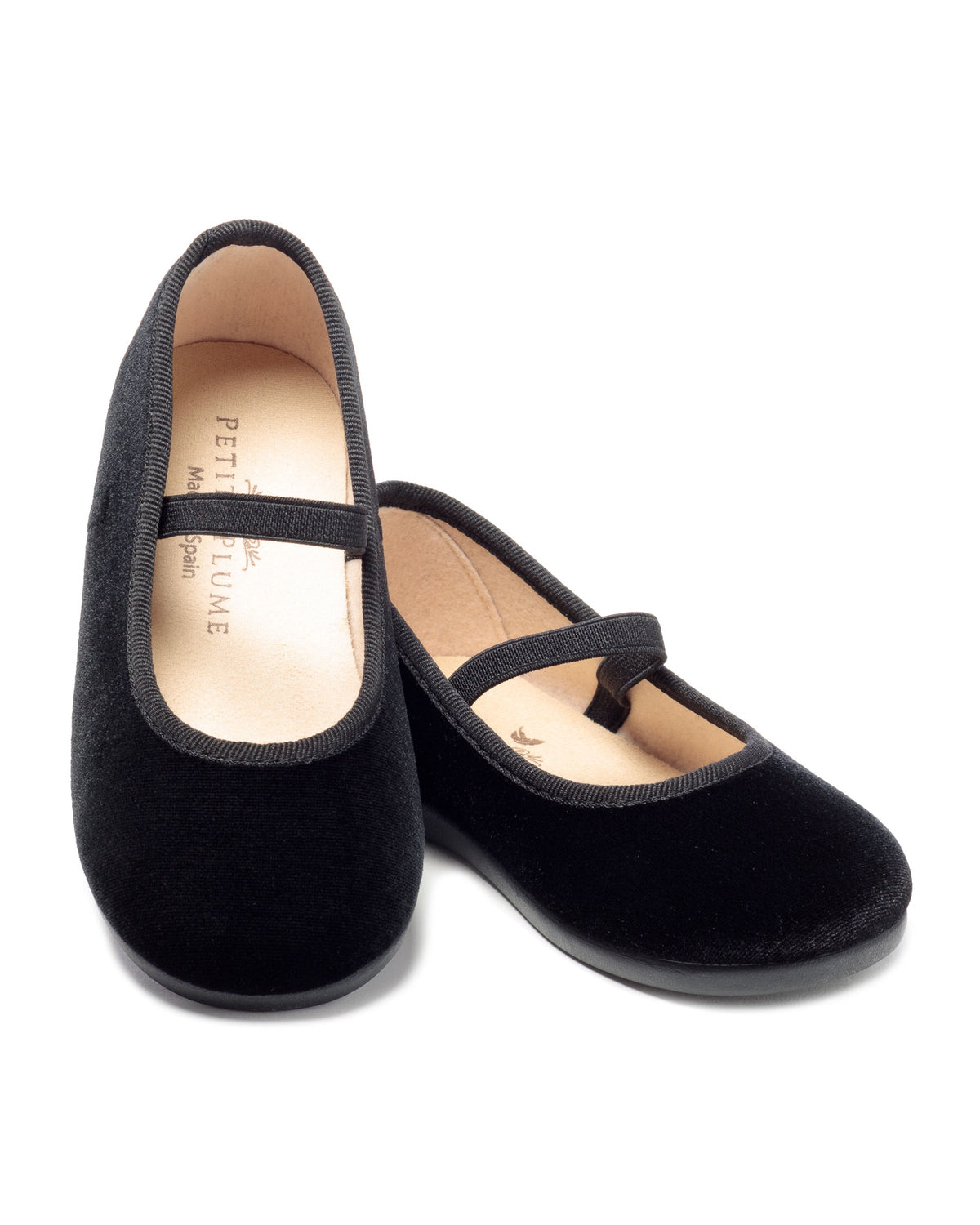 Top view of Delphine Slipper in Black Velvet showcasing velvet uppers with Mary Jane straps and soft insoles on white background