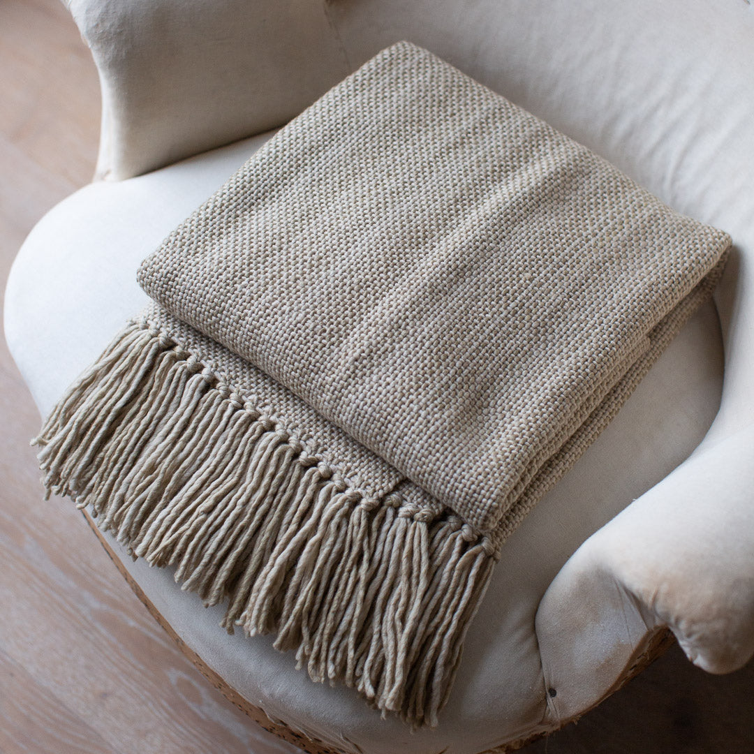 TASSELED HANDWOVEN MERINO WOOL BLANKET IN NATURAL