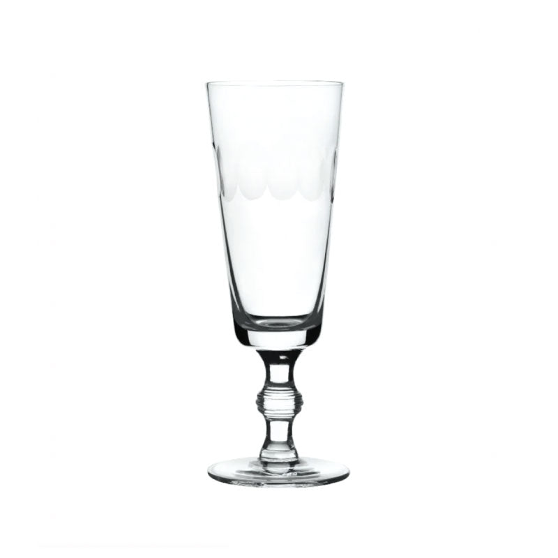Front view of crystal champagne flute showcasing engraved lens oval pattern and short twisted stem on white background
