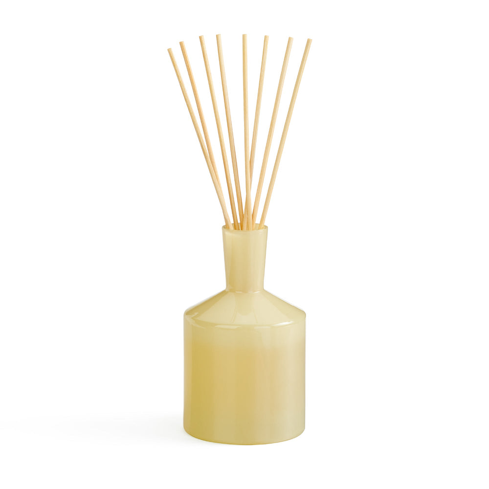 Front view of Chamomile Lavender Reed Diffuser showcasing its hand-blown glass vessel and reeds on a white background