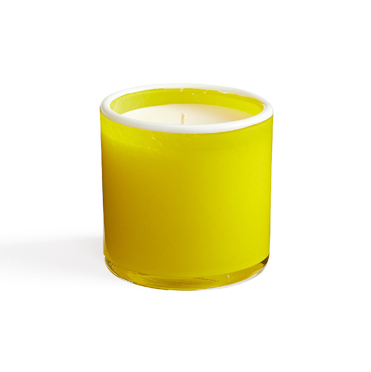 Front view of White Grapefruit candle showing bright yellow hand-blown glass vessel with white wax on white background