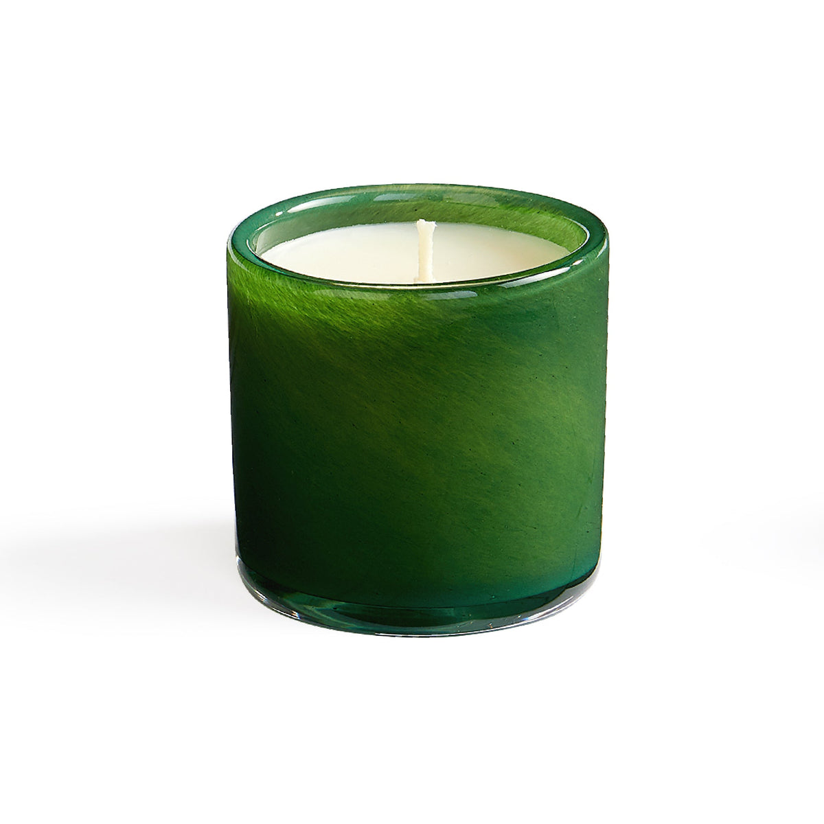 Front view of Jungle Bloom candle in green hand-blown glass showing white wax and single cotton wick on white background