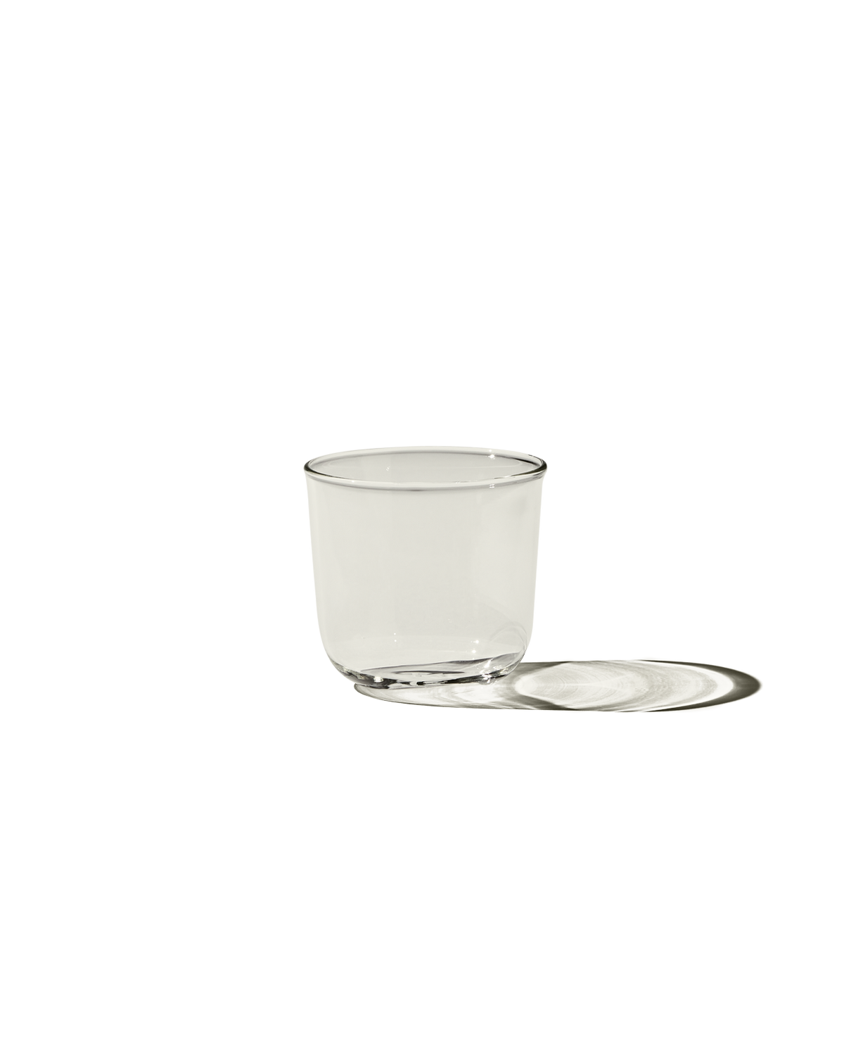 Front view of The Half Glass, Set of 4 showcasing clear borosilicate glass with a neutral background