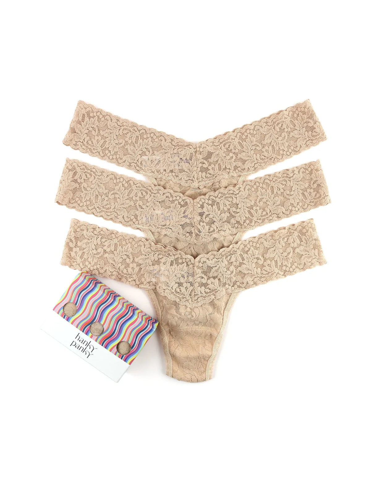 Overhead view of 3-Pack Low Rise Thongs showcasing three nude shaded stretch lace thongs on a white background