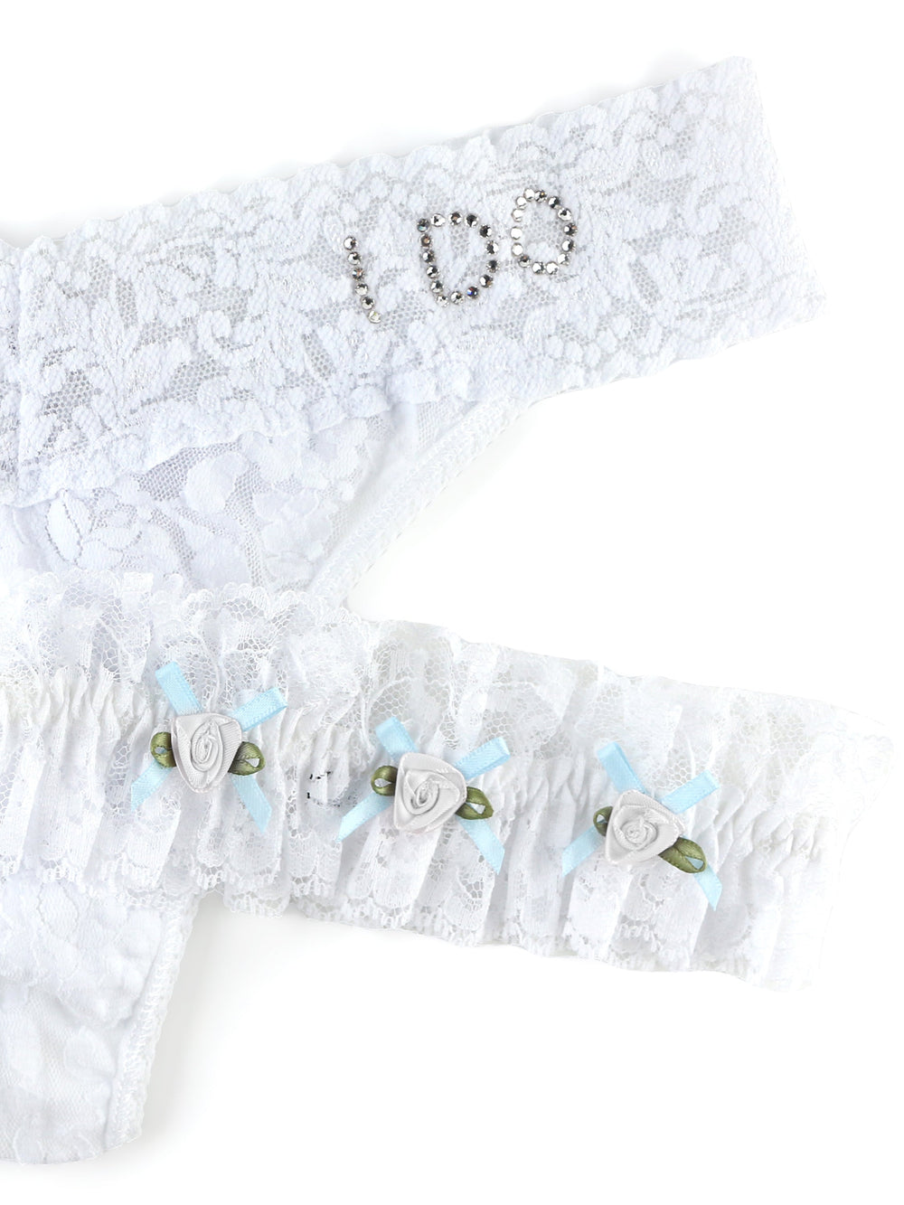 Top view of I Do Original Rise thong and garter showcasing rhinestone I DO waistband and blue ribbon rose accents on white background