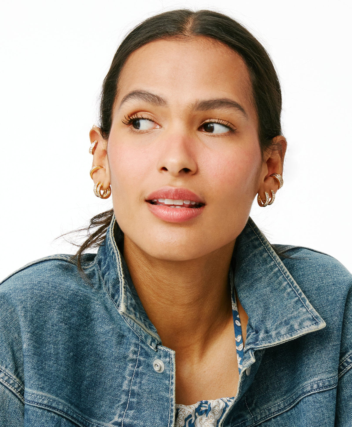 Close-up of Hug Me Earrings & Ear Cuff Set showcasing gold-tone hoops and cubic zirconia ear cuff on a model