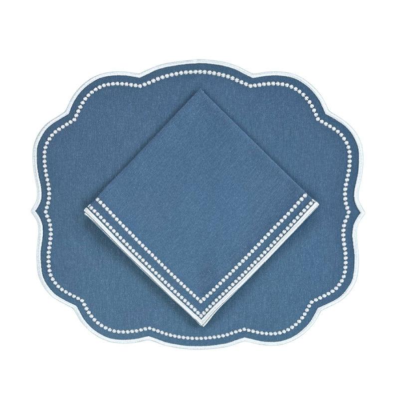 Autumn blue placemat with white embroidery and matching napkin