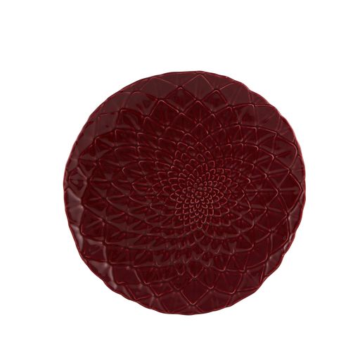 Top view of Amazonia Dinner Plate showcasing a raised floral pattern and scalloped edge on a white background
