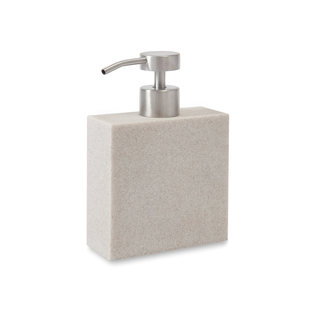 Three quarter view of Slate lotion dispenser in ivory with rectangular resin body and brushed metal pump on white background