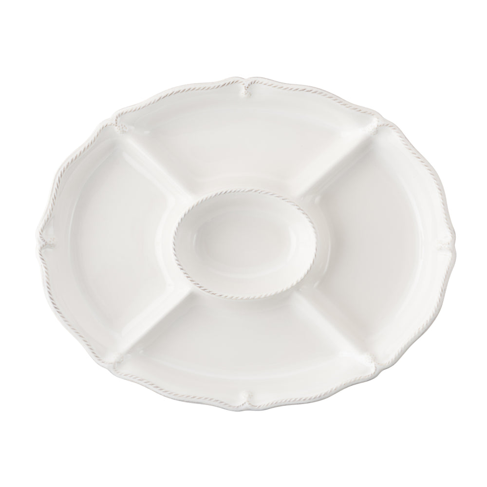 Top view of Berry & Thread Whitewash Crudité platter with center dip, four divided sections and scalloped edge on white