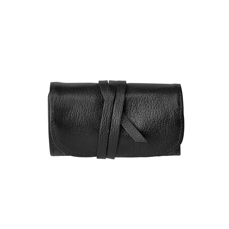 Front view of black goatskin leather Small Leather Jewelry Roll showcasing its wraparound leather tie closure with a white background