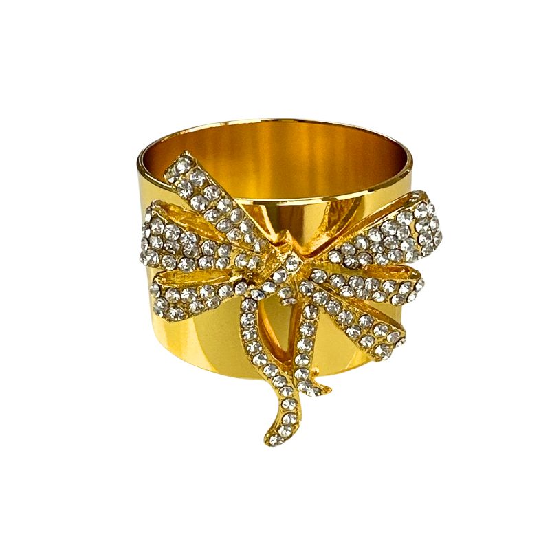 Front view of Jeweled Bow Napkin Rings, Set of 4 showcasing gold finish and a clear jeweled bow on white background