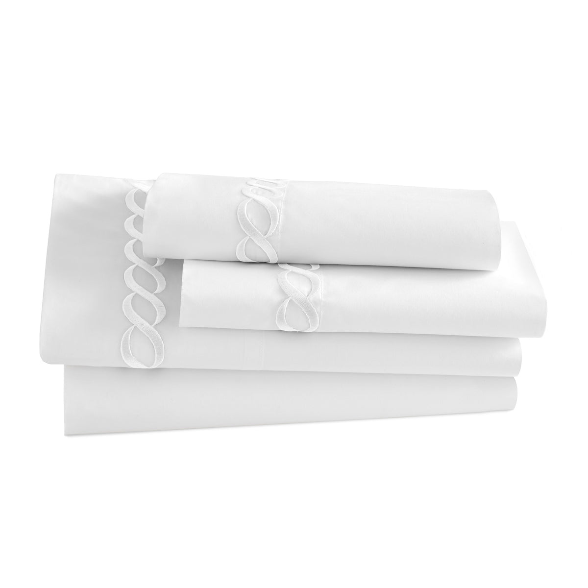 Folded Catena queen fitted sheet showcasing white fabric with embroidered cable trim on a white background
