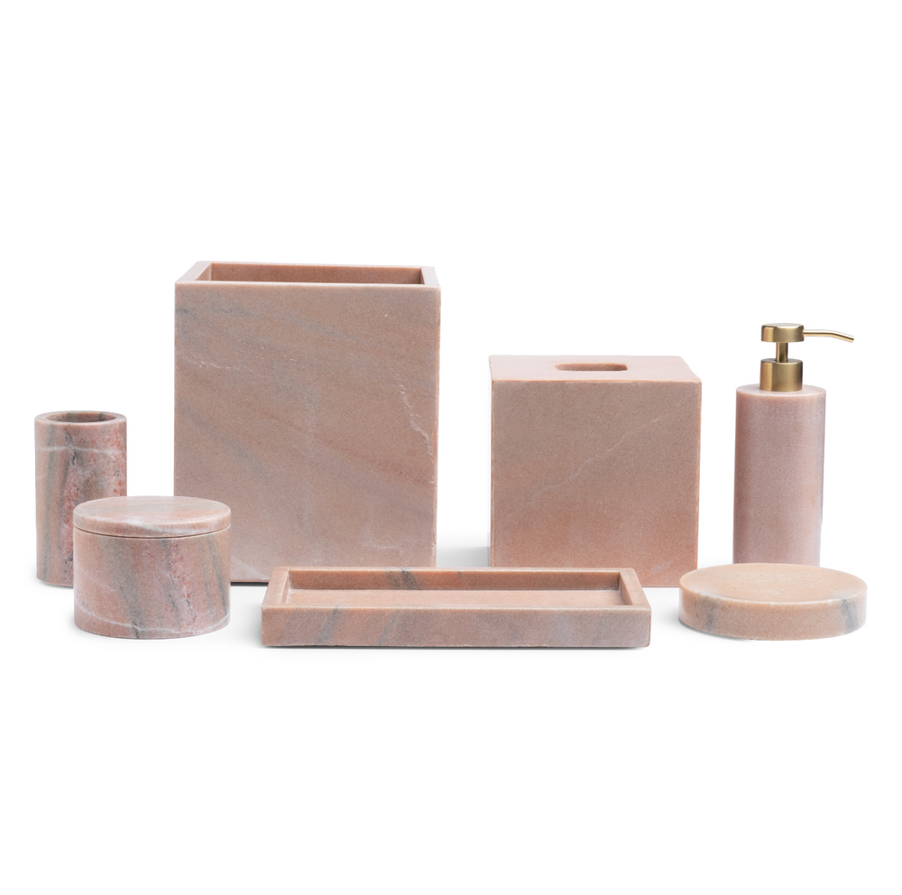Front view of Rossa toothbrush holder and matching bathroom accessory set in dusty rose veined marble on white background