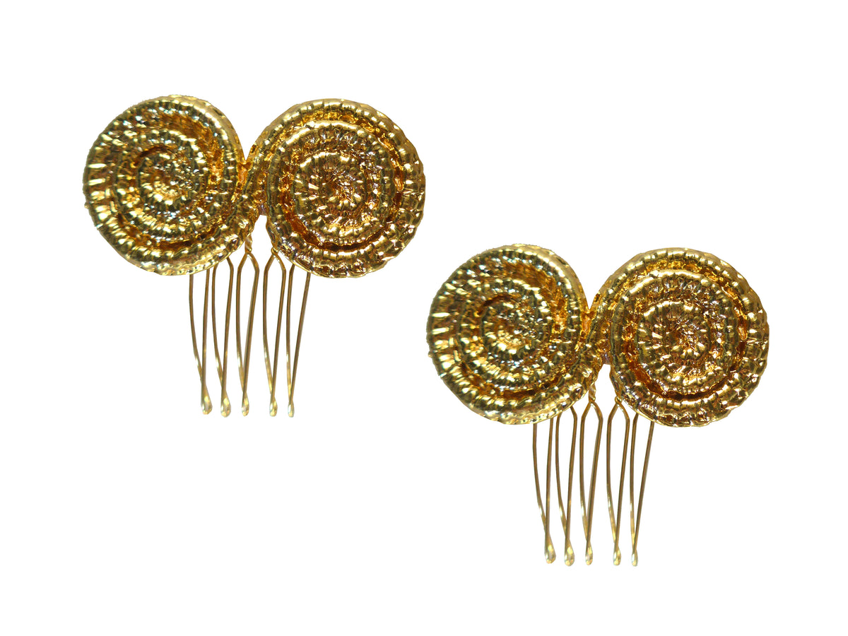 Front view of Mini Spiral Comb, Set of 2 showcasing round textured tops and fine teeth on a white background