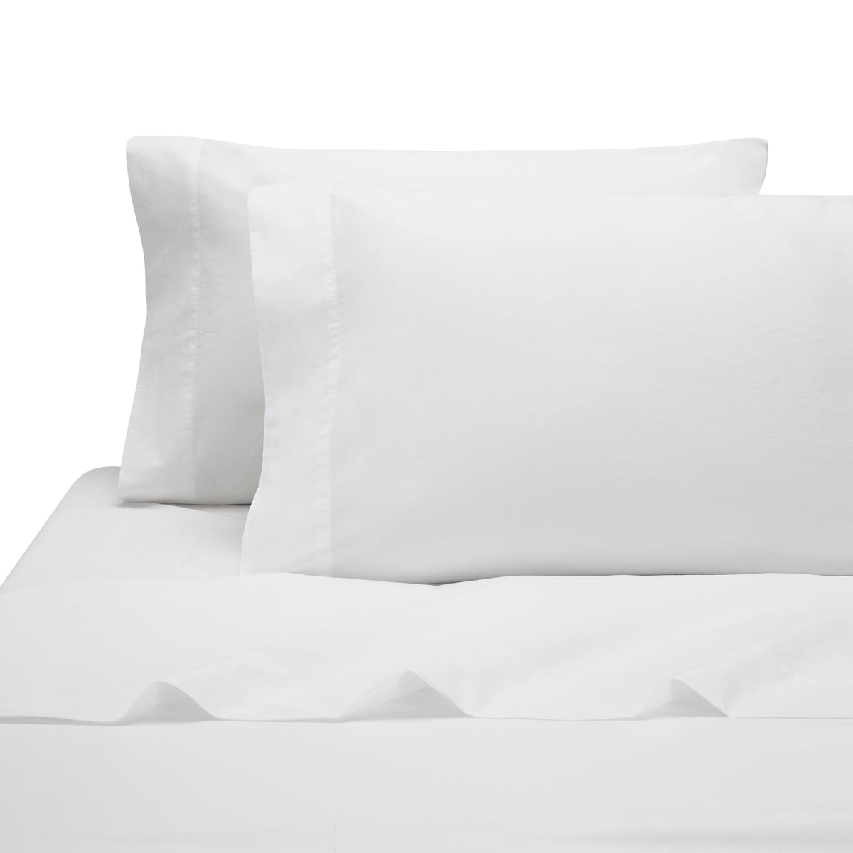 Front view of Lorimer twin flat sheet in white on a bed with matching pillowcases showing soft garment-washed percale texture