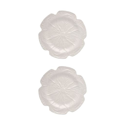 Top view of two beige cabbage charger plates showing embossed cabbage-leaf texture on white background