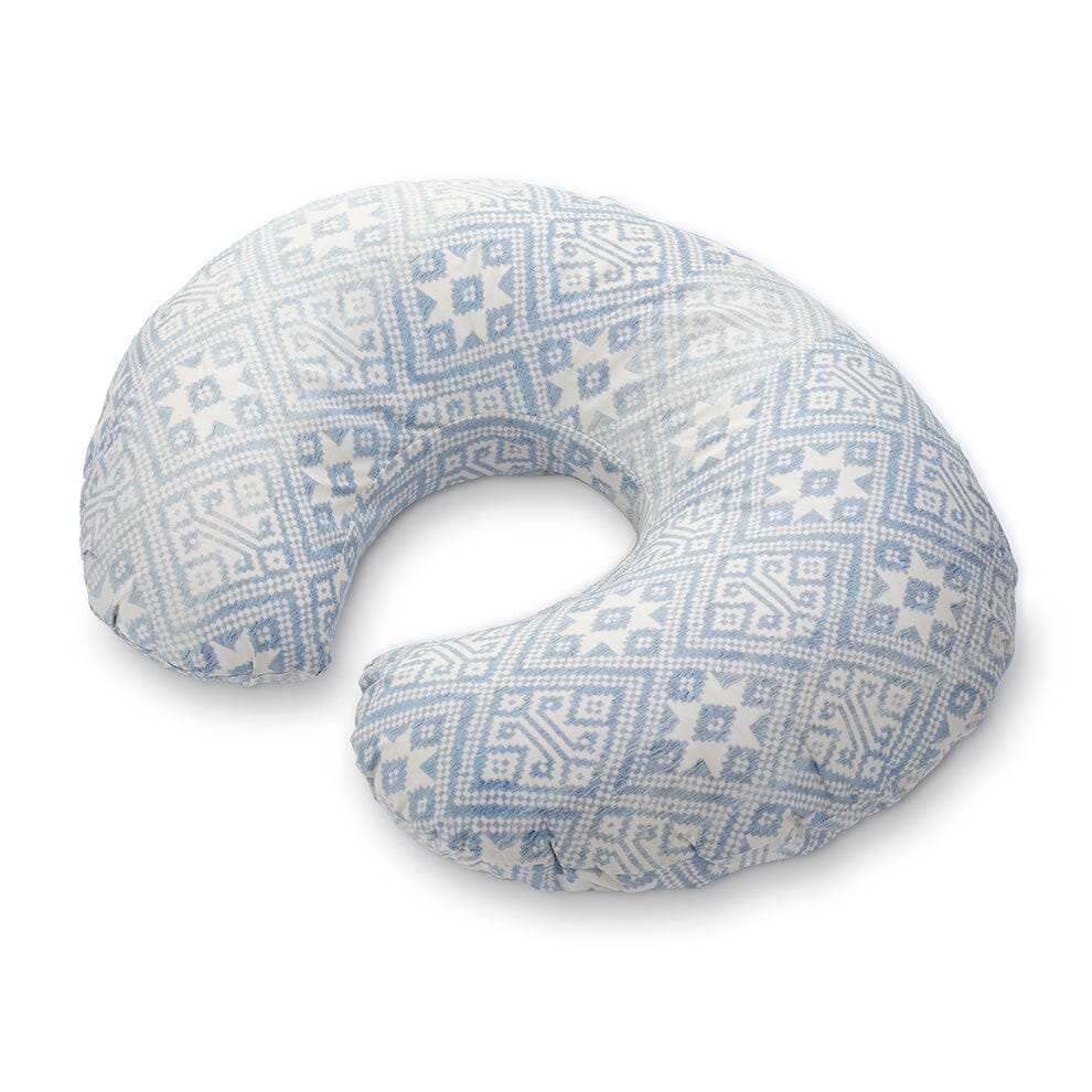 Three-quarter view of Light Star Muong nursing pillow cover showing blue geometric star pattern on white background