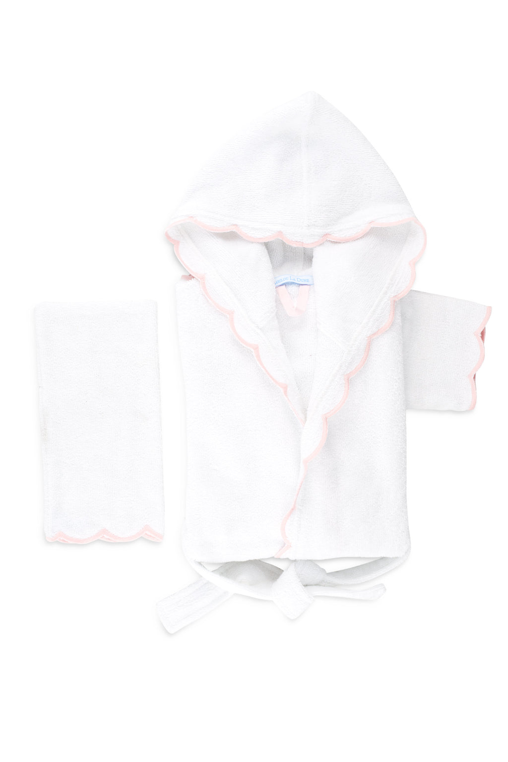 Top-down view of Loulou toddler hooded bathrobe set showing scalloped pink trim and matching washcloth on white background