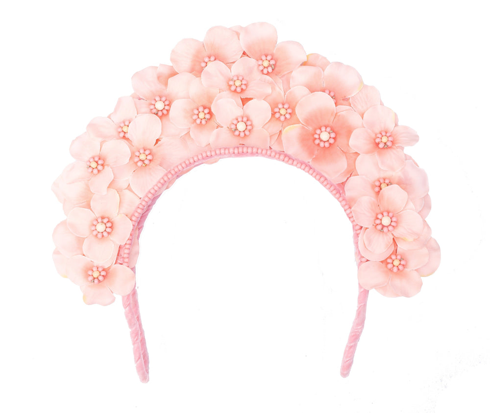 Front view of Flower Crown Headpiece in Peony Pink showcasing layered fabric flowers with beaded centers on a white background