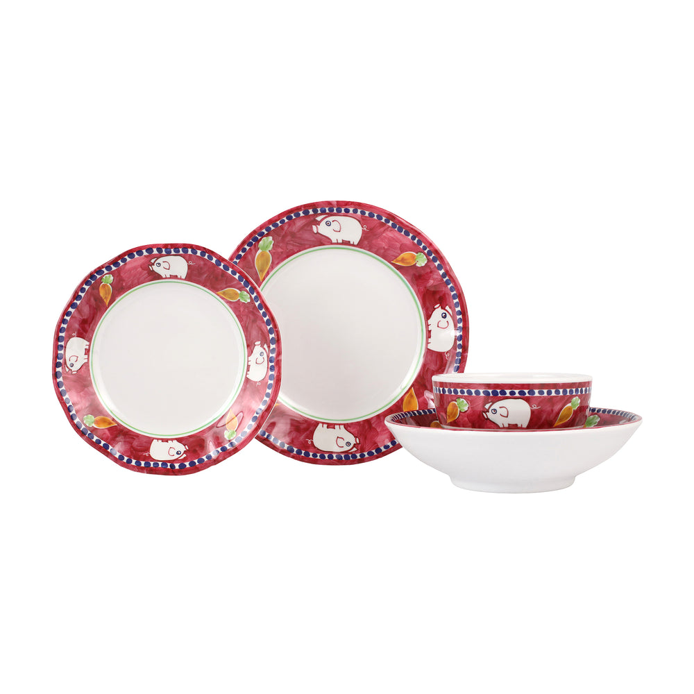 Front view of Melamine Campagna four-piece melamine set with red rims and white pig motif on white background