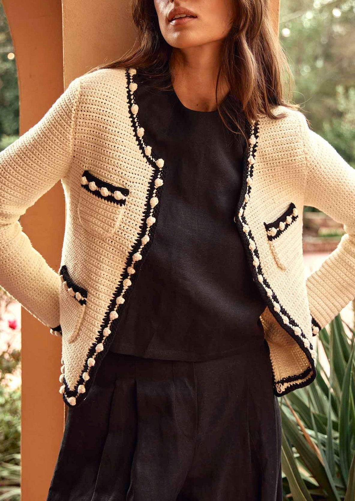 The Russell is an open front crochet jacket with ribbing at the placket, sleeve cuffs and hem.