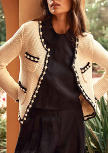The Russell is an open front crochet jacket with ribbing at the placket, sleeve cuffs and hem.