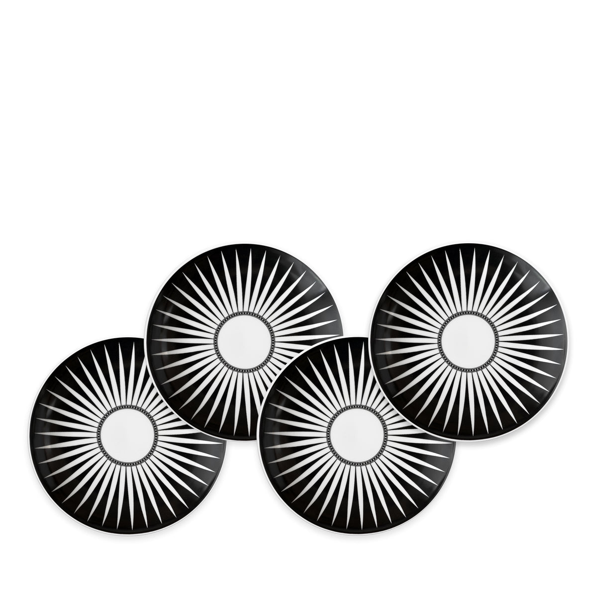 Front view of four Marrakech canape plates showcasing black and white radiating patterns on a white background