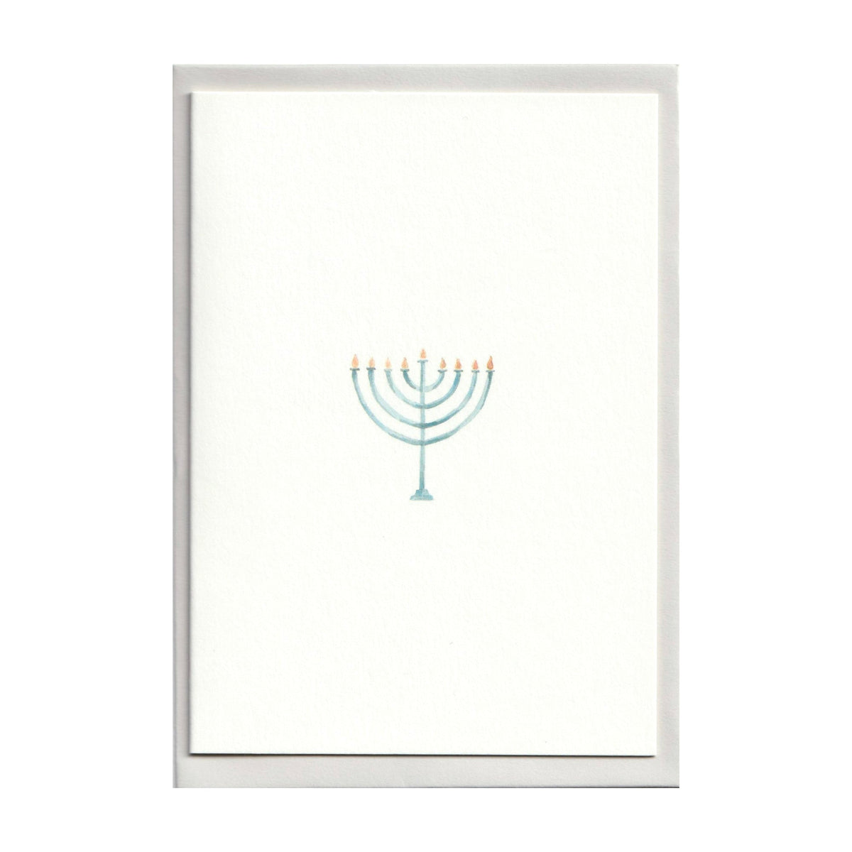 Front view of Hanukkah card showcasing a watercolor menorah on white heavy stock paper