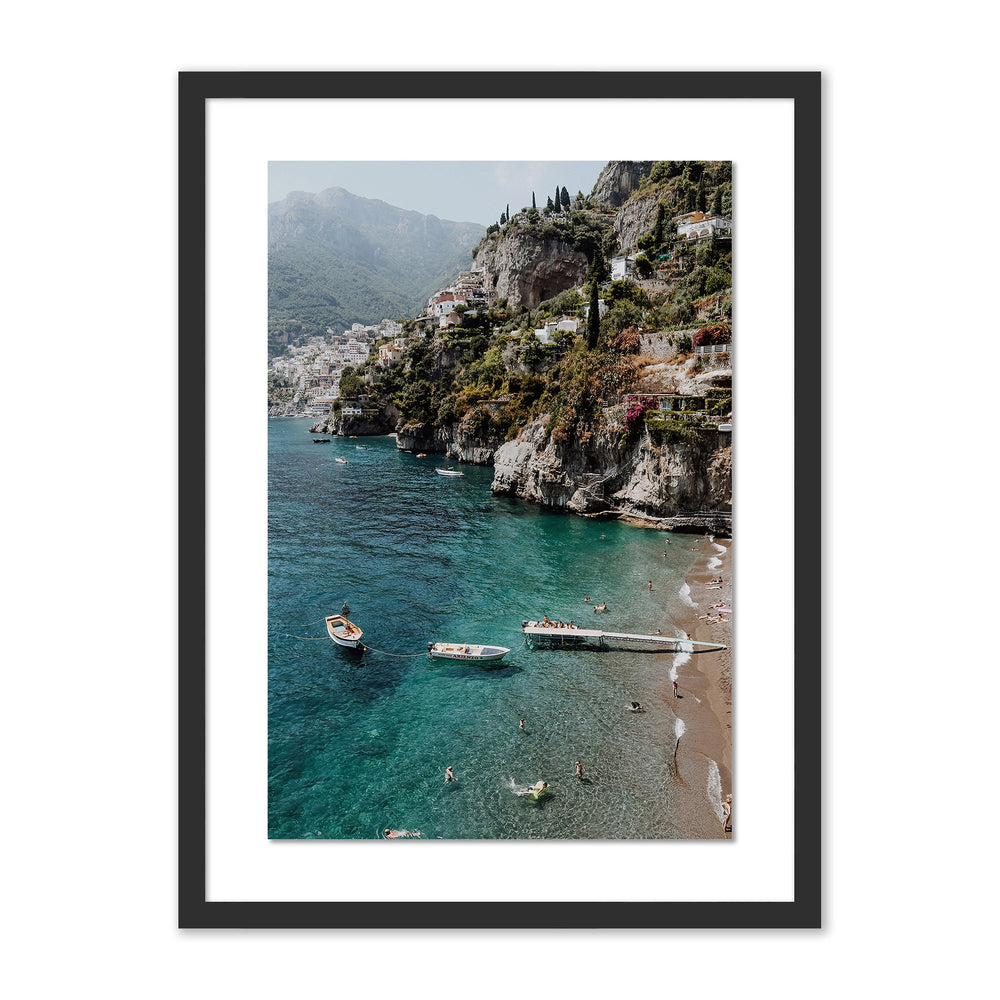 Front view of Bagni D’Arienzo II framed print showcasing Amalfi Coast cliffside, turquoise sea with small boats and swimmers