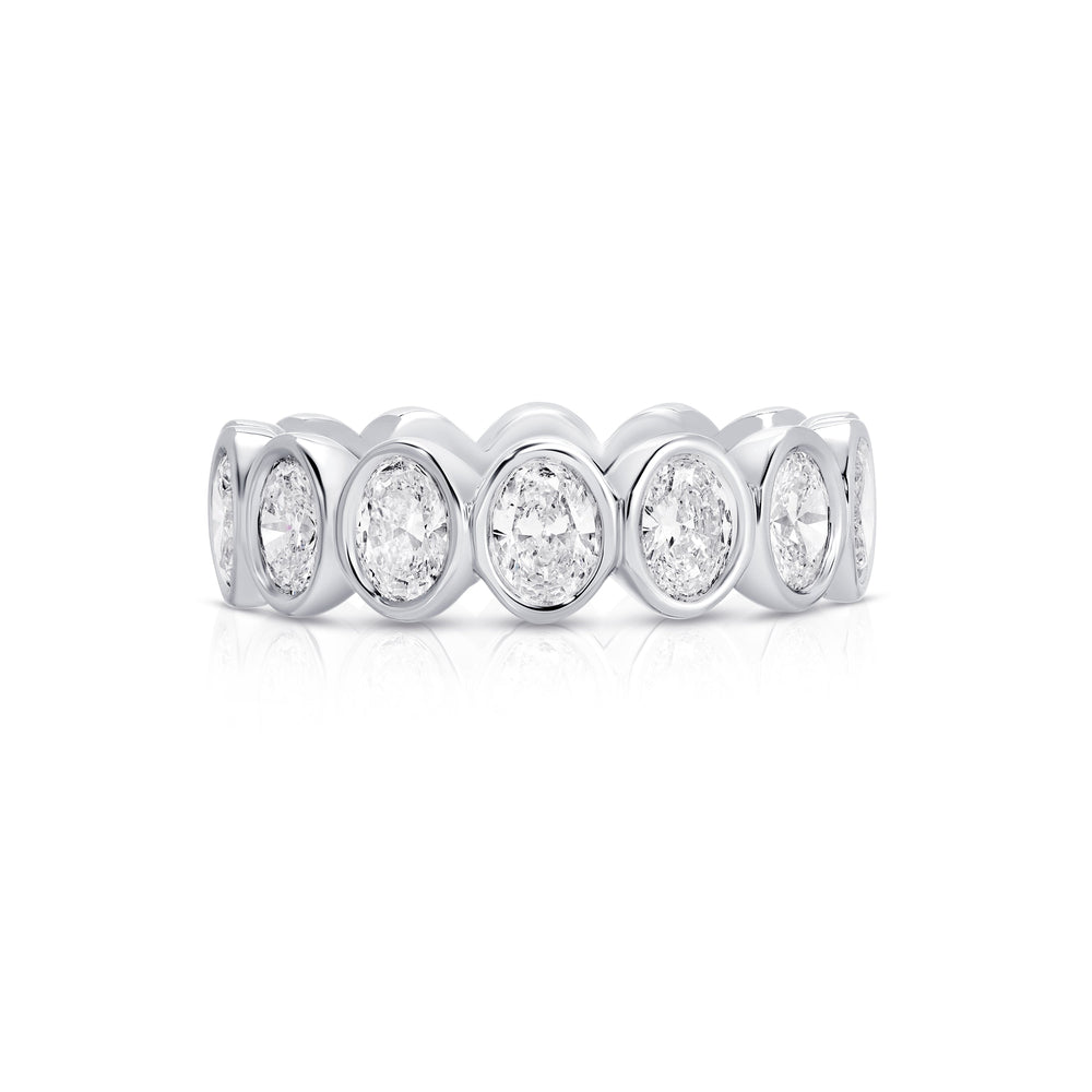Front view of NS Bezel Oval Eternity Band in 14K white gold showcasing bezel-set oval diamonds on a white background
