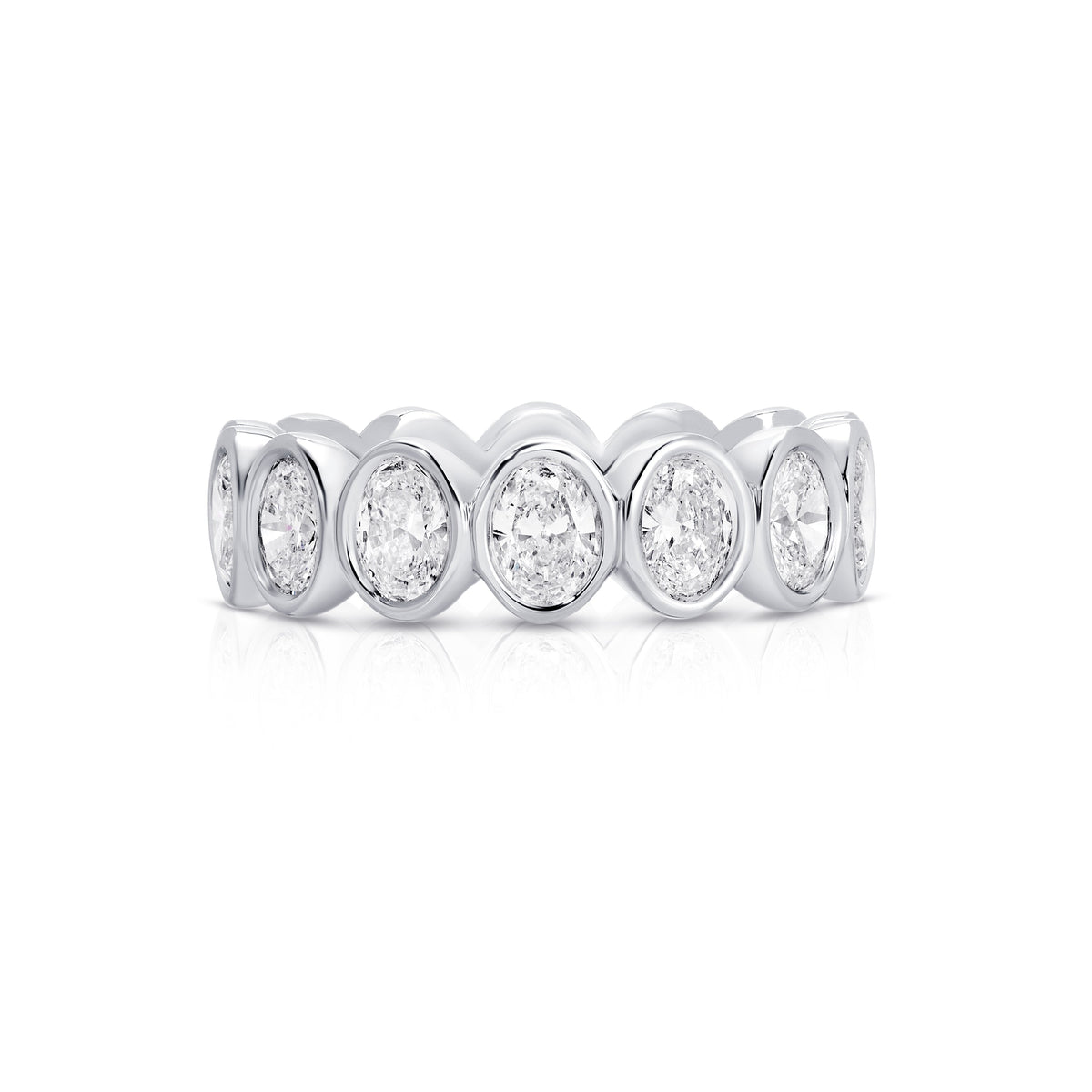 Front view of NS Bezel Oval Eternity Band in 14K white gold showcasing bezel-set oval diamonds on a white background