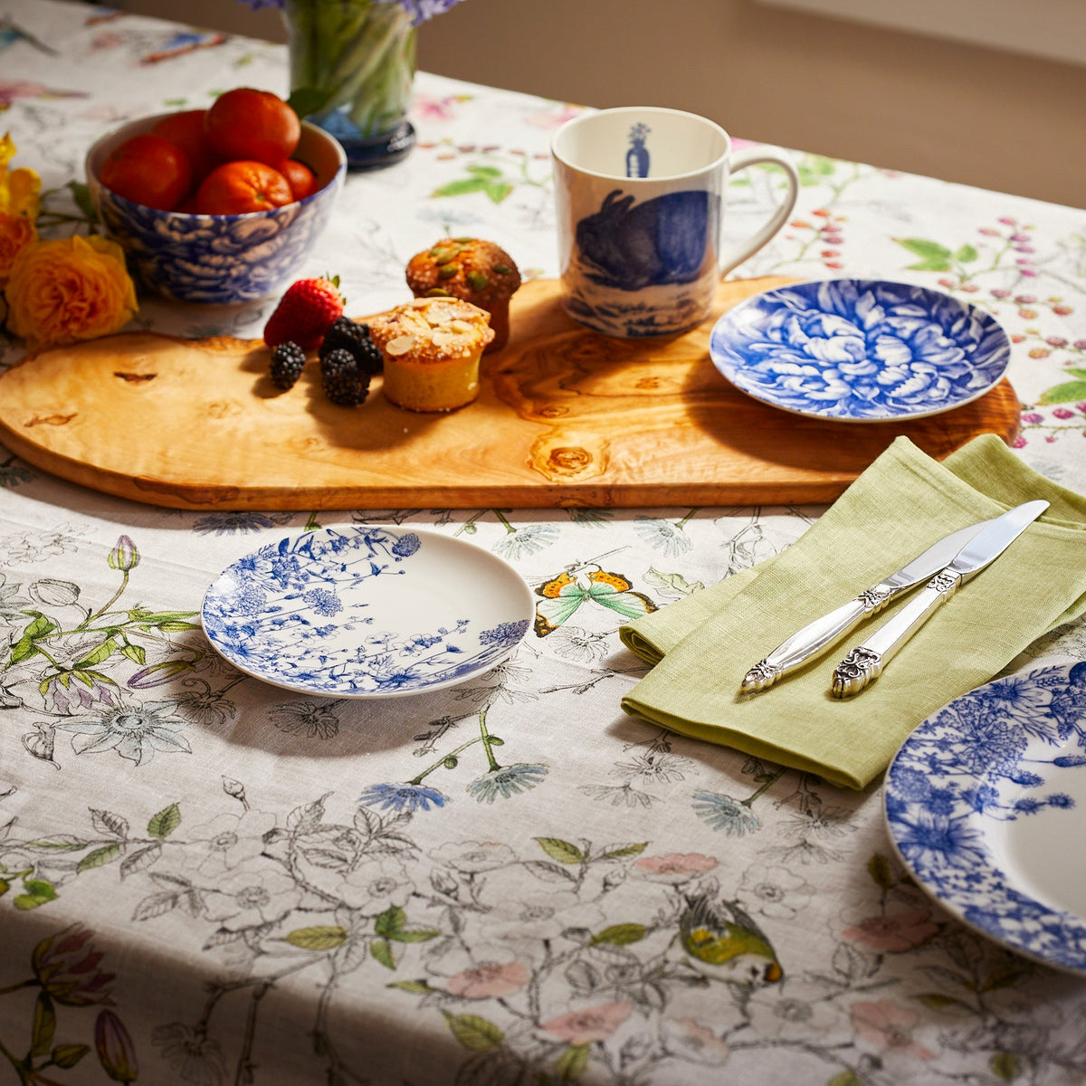 Breakfast table set with Summer Blues Canape Plate, Peony Canape Plate and Summer Blues Dinner Plate in Blue and White Porcelain from Caskata