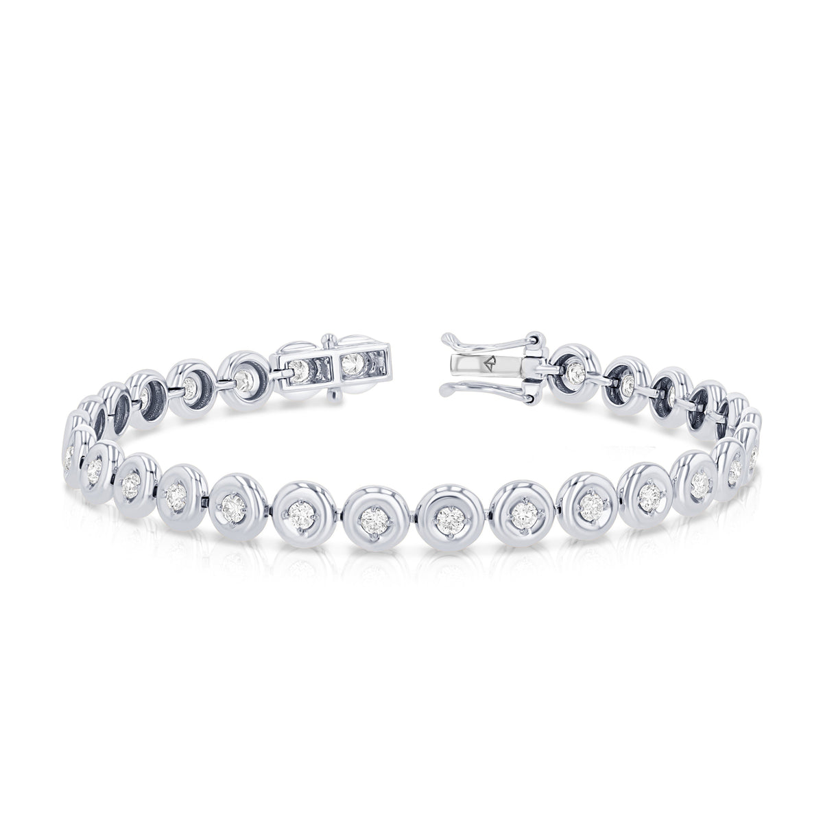 Angled view of 14K white gold Orb tennis bracelet showcasing bezel-set round diamonds on white background