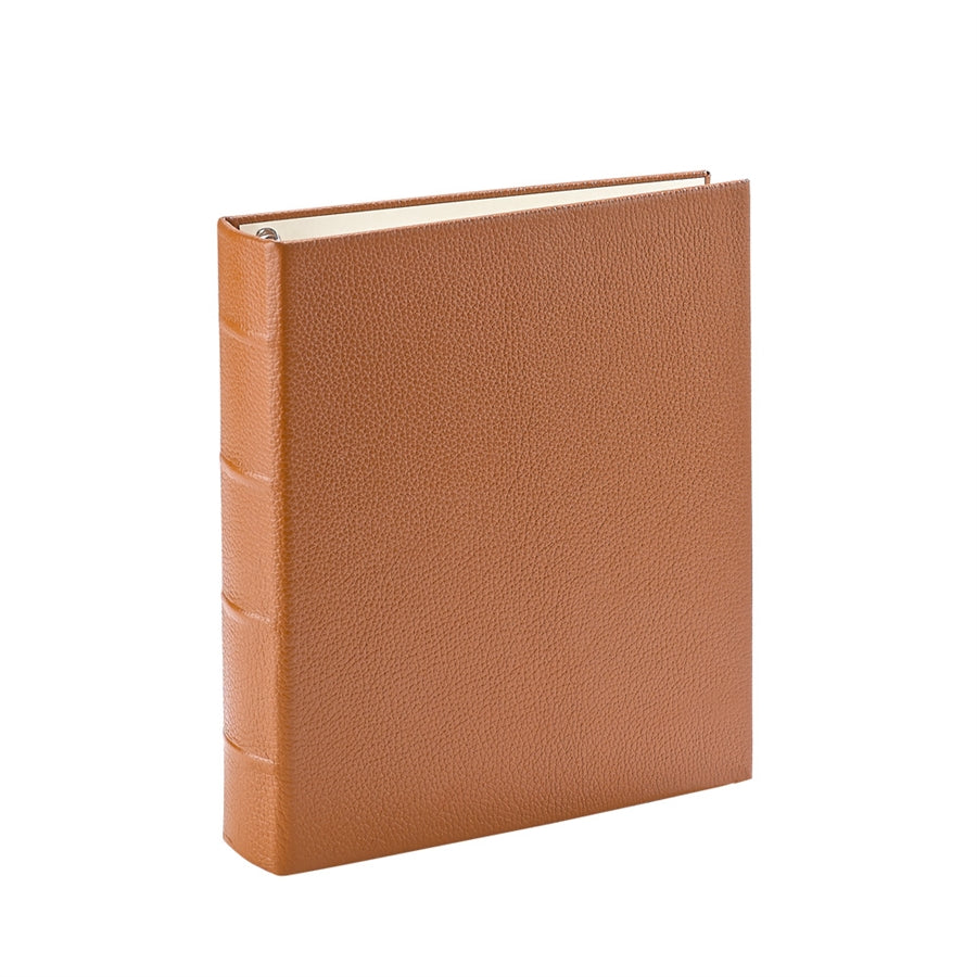 Three-quarter view of Medium Ring Clear Pocket Album showing saddle leather cover and exposed 3-ring posts on white background